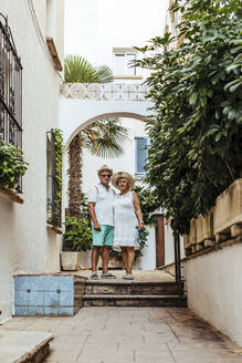 Senior tourist couple in a village, El Roc de Sant Gaieta, Spain - MOSF00035