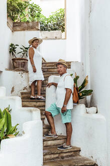 Senior tourist couple in a village, El Roc de Sant Gaieta, Spain - MOSF00036