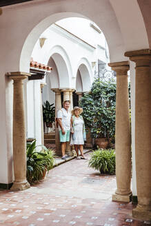 Senior tourist couple in a village, El Roc de Sant Gaieta, Spain - MOSF00042