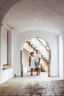 Senior tourist couple in a village, El Roc de Sant Gaieta, Spain - MOSF00043