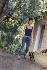 Smiling woman with dogs - JOHF02623