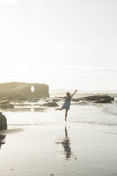 Happy woman enjoying the beach - AHSF00886