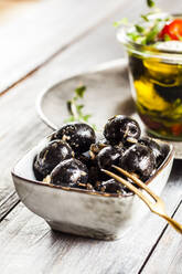 Bowl of black olives with garlic - SBDF04051