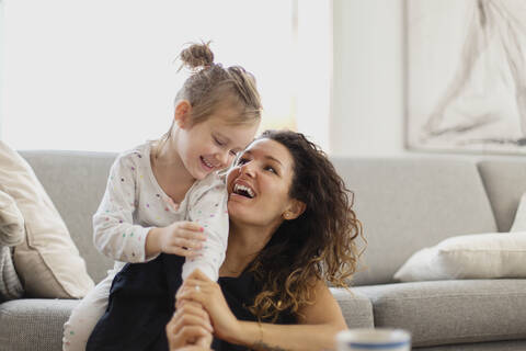 Happy mother and daughter together stock photo