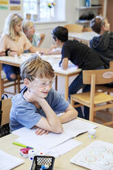 Boy in classroom - JOHF03408