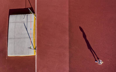 Germany, Baden-Wurttemberg, Schorndorf, Female athlete concentrating before high jump - STSF02287