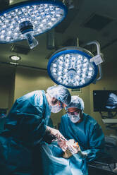 Surgeons during a foot surgery - DAMF00181