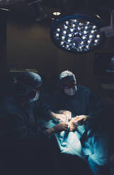 Surgeons during a foot surgery - DAMF00186