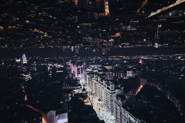 Spanien, Madrid, Doppelbelichtung der beleuchteten Gran Via Straße bei Nacht - JCMF00248