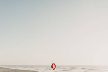 Life belt on the beach, Costa Nova, Portugal - AHSF00922