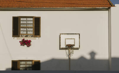 View of basketball hoop outside of the house, Costa Nova, Portugal - AHSF00948