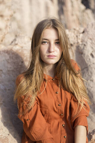 Portrait of a female teenager outdoors stock photo