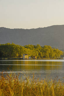 Houses on the shore of Lake Estany de Banyoles, Gerona, Spain - MOSF00105