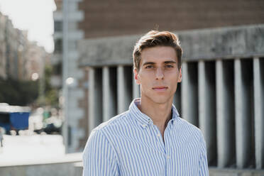 Portrait of a young stylish man in the city - JMHMF00025