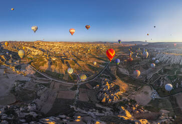 Aerial view of hot air balloons flying over Cappadocia, Turkey - AAEF05637