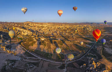 Aerial view of hot air balloons flying over Cappadocia, Turkey - AAEF05639