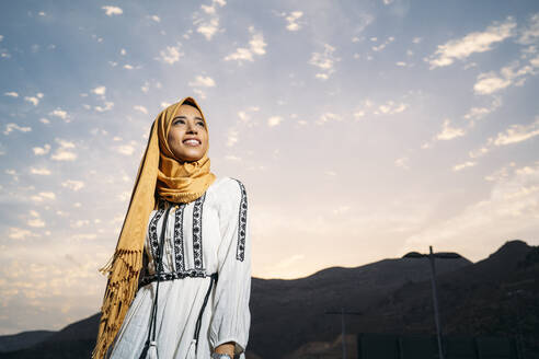 Young muslim woman wearing yellow hijab - MPPF00236