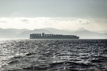 Spain, Andalucia, Tarifa, Freight ship in Strait of Gibraltar - KBF00619