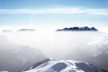 Snow covered mountain landscape with mist, Alpe-d'Huez, Rhone-Alpes, France - CUF52646