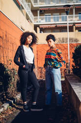 Two cool young female friends in urban garden, portrait - CUF52802