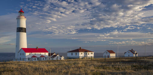 Point Amour Lighthouse with clouds in evening light - CAVF66239