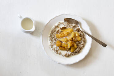 Plate of rye porridge with quince compote - EVGF03535