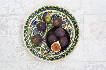 Overhead view of fresh figs on plate - LVF08396