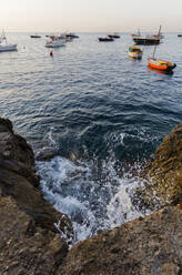 Boats moored on sea against clear sky - CAVF67246