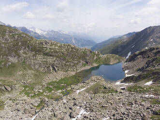 Aerial view of an Alpine lake in Switzerland - CAVF67292