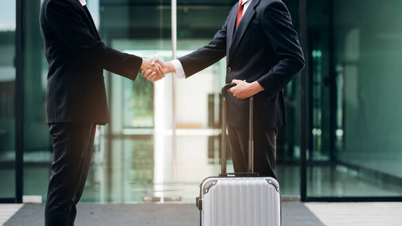Businessmans handshake after good deal. - CAVF67595