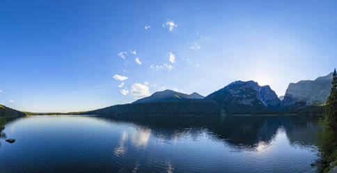 Scenic view of lake against mountains and sky - CAVF67672