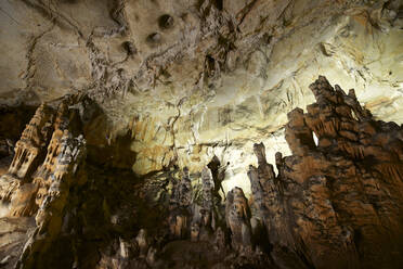 Low angle view of rock formations in cave - CAVF68026