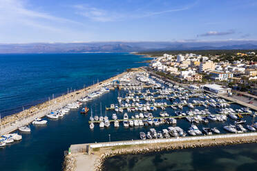 Spain, Mallorca, Aerial view of boats moored in Can Picafort resort harbor - AMF07407