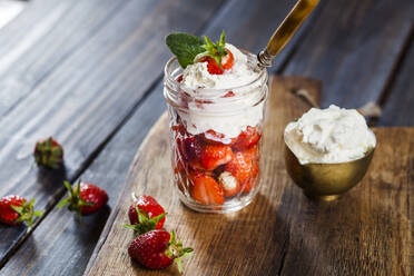 Jar of fresh strawberries with whipped cream - SBDF04107