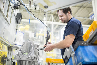 Man working in a modern factory - WESTF24261