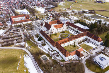 Aerial view over Benedictine monastery Benediktbeuren in winter, Bavaria, Germany - AMF07442