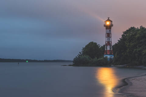 Germany, Hamburg, Rissen lighthouse at dusk stock photo