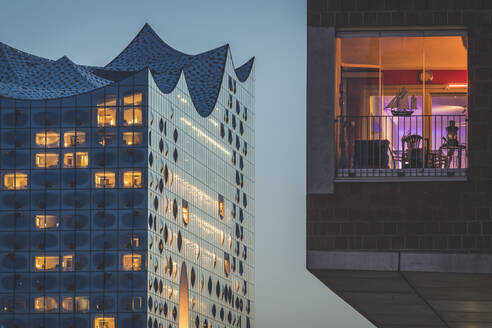 Germany, Hamburg, Hafencity, Sandtorhafen, Elbphilharmonie at dusk  - KEBF01397