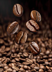 Close up of freshly roasted coffee beans - RAMF00085