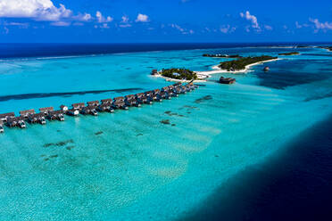 Maldives, South Male Atoll, Kaafu Atoll, Aerial view of Bungalows on sea - AMF07464