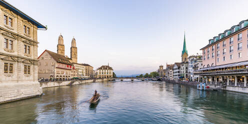 Switzerland, Canton of Zurich, Zurich, River Limmat between old town waterfront buildings at early dusk - WDF05552