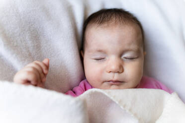 Portrait of sleeping baby girl with cat toy - GEMF03286