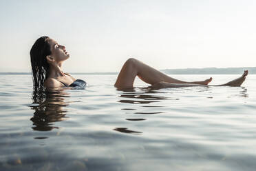 Young woman bathing in Lake Starnberg, Germany - WFF00158