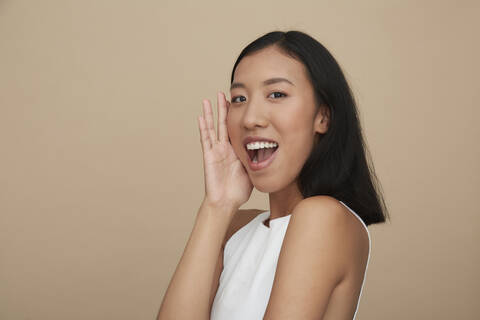 Portrait of young female Chinese woman, open mouth stock photo