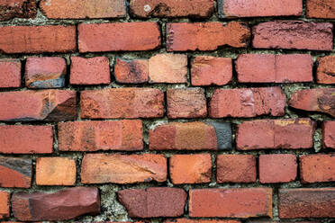 Nahaufnahme einer roten Backsteinmauer. - MINF13060