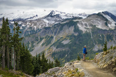 Male With Puffy Jacket with Mountain Views - CAVF68593