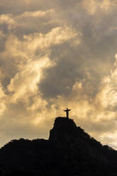 Beautiful sunset landscape with orange clouds over Christ the Redeemer - CAVF69063
