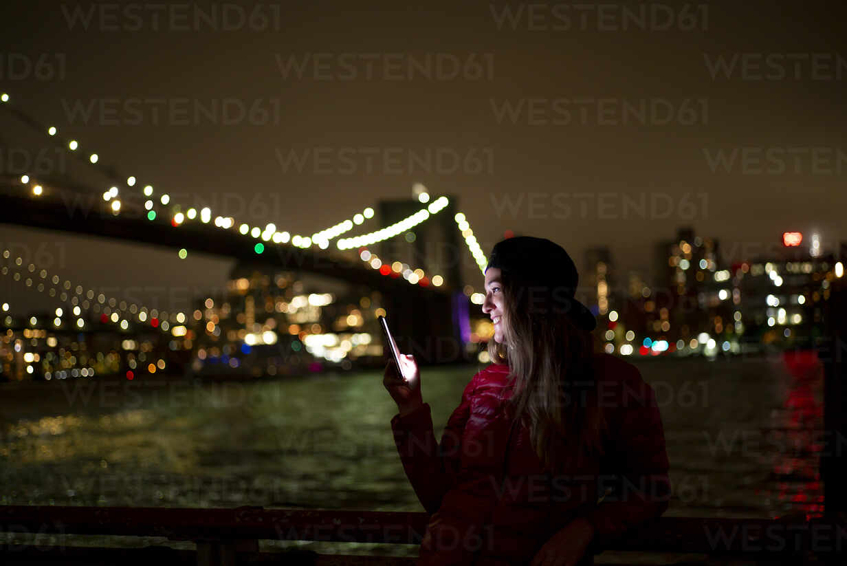 Young Woman in New York City, New York at Night. Stock Image