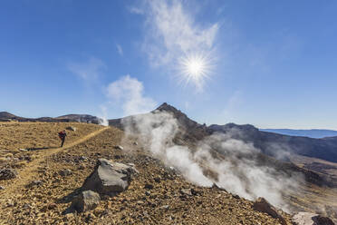 New Zealand, North Island, Sun shining over fumaroles in North Island Volcanic Plateau - FOF11064