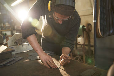 Man making knives in a workshop - PMF00891